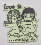 Vintage 1970 United Features Syndicate Kim Casali "Love is ..." "... catching." Light Green Rubber Fridge Magnet