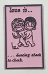Vintage 1970 United Features Syndicate Kim Casali "Love is ..." "... dancing cheek to cheek." Pink Rubber Fridge Magnet