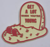 Vintage "Get A Lot When You're Young" Graveyard Plot Themed Rubber Fridge Magnet