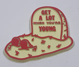 Vintage "Get A Lot When You're Young" Graveyard Plot Themed Rubber Fridge Magnet