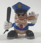 2003 X-Concepts Tech Deck Police Officer Holding Baton and Donut 2 1/4" Tall Toy Skateboarding Figure with Magnetic Feet