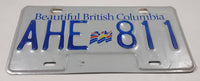 Beautiful British Columbia White with Blue Letters Vehicle License Plate AHE 811