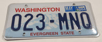 2004 Washington "Evergreen State" in Red on White and Blue Mountain Backdrop with Blue Letters Vehicle License Plate 023 MNQ