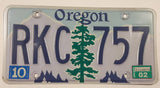 2002 Oregon Green Tree with Dark Blue Letters White Vehicle License Plate Tag RKC 757