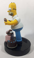 1998 Wesco The Simpsons Homer Simpson With Chocolate Cake and Donuts 9 1/2" Tall Talking Alarm Clock