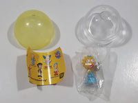 2002 Tomy The Simpsons Maggie Simpson Miniature 1 1/4" Tall Toy Figure in Egg