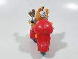 1989 McDonald's Garfield and Odie on a Motorbike Toy Vehicle and Figure