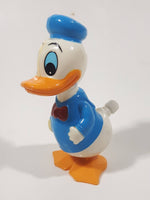 Tomy Walt Disney Productions Donald Duck Wobbling Shaking Wind Up Plastic Toy Figure