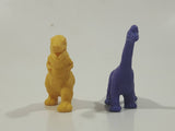 Set of 2 Toy Rubber Dinosaur Figures One Yellow One Purple