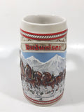 1985 Budweiser Holiday Stein Collection "A" Series "The hitch journeying through snow-capped mountains on a crisp winter's morn." 6 3/8" Tall Ceramic Beer Stein Mug