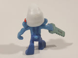 2011 Peyo "Carpenter" Smurf Holding a Saw with a Pencil in His Ear PVC Toy Figure McDonald's Happy Meal