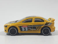 2019 Hot Wheels Backroad Rally 2008 Lancer Evolution Yellow Die Cast Toy Car Vehicle