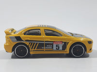 2019 Hot Wheels Backroad Rally 2008 Lancer Evolution Yellow Die Cast Toy Car Vehicle