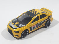 2019 Hot Wheels Backroad Rally 2008 Lancer Evolution Yellow Die Cast Toy Car Vehicle