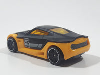 2014 Hot Wheels Ultimate Racing Symbolic Black and Orange #5 Die Cast Toy Car Vehicle