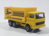 Majorette Leon's Canada's Only Furniture Superstores Semi Truck Yellow 1/100 Scale Die Cast Toy Car Vehicle with Opening Rear Doors