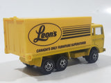 Majorette Leon's Canada's Only Furniture Superstores Semi Truck Yellow 1/100 Scale Die Cast Toy Car Vehicle with Opening Rear Doors