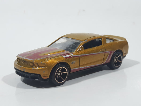 2011 Hot Wheels Faster Than Ever 2010 Ford Mustang GT Metalflake Gold Die Cast Toy Car Vehicle