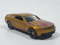 2011 Hot Wheels Faster Than Ever 2010 Ford Mustang GT Metalflake Gold Die Cast Toy Car Vehicle