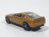 2011 Hot Wheels Faster Than Ever 2010 Ford Mustang GT Metalflake Gold Die Cast Toy Car Vehicle