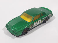 2010 Hot Wheels Race World Movie Stunts '84 Pontiac Grand Prix Metallic Green Die Cast Toy Car Vehicle