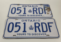 Matching Set of 1993 Ontario Yours To Discover White with Blue Letters Vehicle License Plate 051 RDF