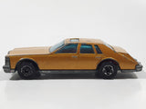 Vintage 1983 Hot Wheels Cadillac Seville Metalflake Gold Die Cast Toy Car Vehicle