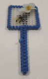 Blue Yarn Trimmed Plastic Mesh Fly Swatter with Fly and White Flower 1 3/8" x 4" Fridge Magnet