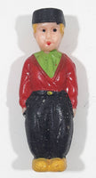 Dutch Boy in Green Top with Red Sweater and Black Pants 5/8" x 1 3/4" Celluloid Fridge Magnet