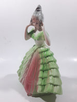 Vintage Lady in Green and Pink Dress with Grey Bonnet 7 3/4" Tall Porcelain Figurine