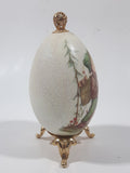 Vintage Hummel Style Boy with Dog and Bag of Puppies 4 1/2" Tall Porcelain Egg On Gold Tone Metal Stand