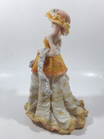 Victorian Woman in Yellow Dress and Hat with Scarf and Purse 8" Tall Resin Figurine Sculpture