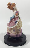 2002 Secret Treasures Girl Holding Flowers in Pretty Dress 8" Tall Resin Figurine on Wood Base