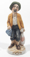 Vintage Hobo Man Holding Bags 7" Tall Porcelain Figurine Made in Japan