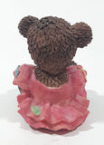 Dark Brown Teddy Bear Sitting In Pink Dress Holding Snake Formed As The Letter G 3 1/2" Tall Resin Figurine