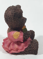 Dark Brown Teddy Bear Sitting In Pink Dress Holding Snake Formed As The Letter G 3 1/2" Tall Resin Figurine