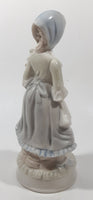 Vintage Sabre Fine Gifts Light Blue and Cream Woman in Bonnet Holding Flowers 8" Tall Ceramic Figurine
