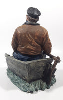 Captain on Rickety Boat Sitting In Busted Up Broken Life Raft Row Boat 9" Tall Weight Resin Figurine