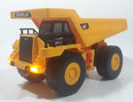 1997 Toy State CAT Caterpillar Dump Truck 9 1/4" Long Yellow Lights and Sound Plastic Toy Car Vehicle