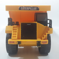 1997 Toy State CAT Caterpillar Dump Truck 9 1/4" Long Yellow Lights and Sound Plastic Toy Car Vehicle