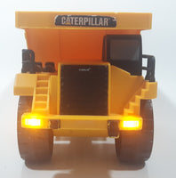 1997 Toy State CAT Caterpillar Dump Truck 9 1/4" Long Yellow Lights and Sound Plastic Toy Car Vehicle