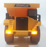 1997 Toy State CAT Caterpillar Dump Truck 9 1/4" Long Yellow Lights and Sound Plastic Toy Car Vehicle