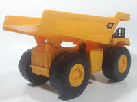 1997 Toy State CAT Caterpillar Dump Truck 9 1/4" Long Yellow Lights and Sound Plastic Toy Car Vehicle