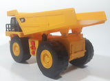 1997 Toy State CAT Caterpillar Dump Truck 9 1/4" Long Yellow Lights and Sound Plastic Toy Car Vehicle