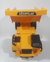 1997 Toy State CAT Caterpillar Dump Truck 9 1/4" Long Yellow Lights and Sound Plastic Toy Car Vehicle