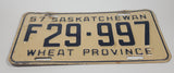 Vintage 1957 Saskatchewan F White with Dark Blue Letters Vehicle Farm License Plate Tag 29 997