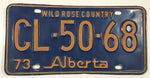 1973 Alberta Wild Rose Country Blue with Yellow Letters Vehicle License Plate CL 50 68