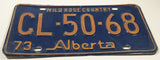 1973 Alberta Wild Rose Country Blue with Yellow Letters Vehicle License Plate CL 50 68