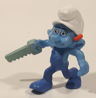 2011 Peyo "Carpenter" Smurf Holding a Saw with a Pencil in His Ear PVC Toy Figure McDonald's Happy Meal