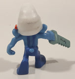 2011 Peyo "Carpenter" Smurf Holding a Saw with a Pencil in His Ear PVC Toy Figure McDonald's Happy Meal